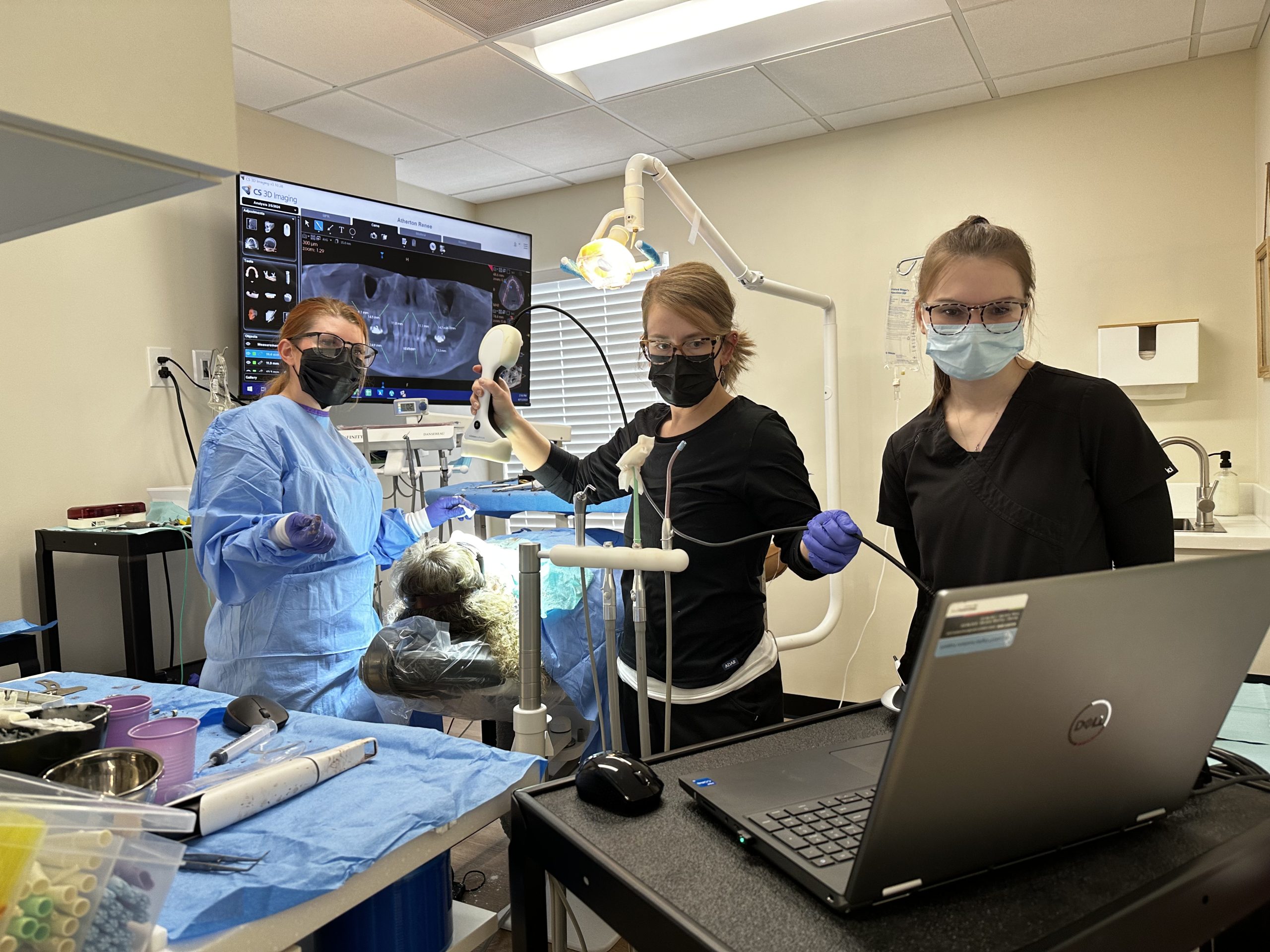 Woodside Dental team providing IV sedation dentistry for dental services in Anchorage, AK